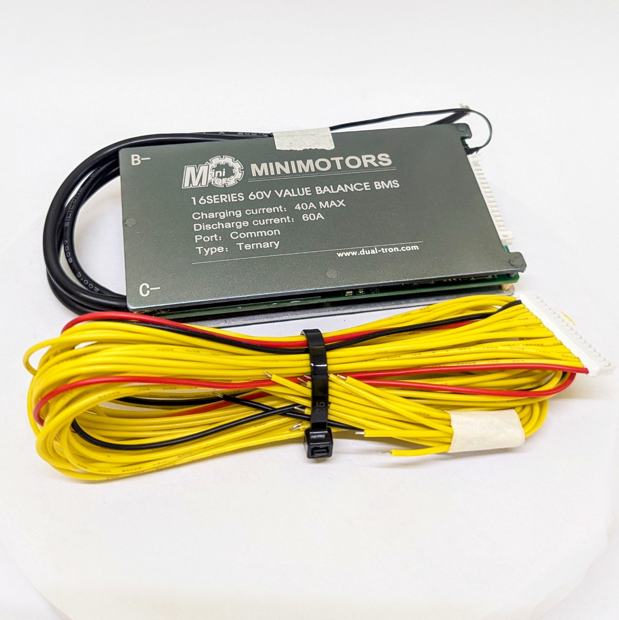 A 60V battery management system BMS for Dualtron Victor with yellow, red, and black wires and connectors.